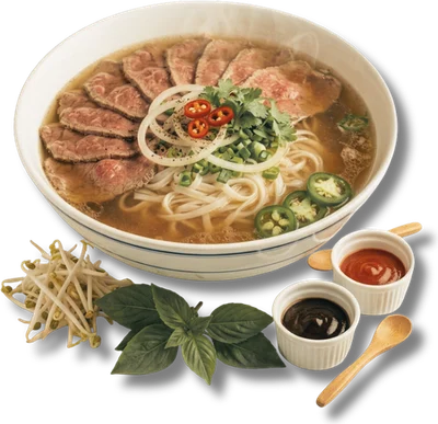 Bowl of rare steak phở with bean sprouts, basil and sauces